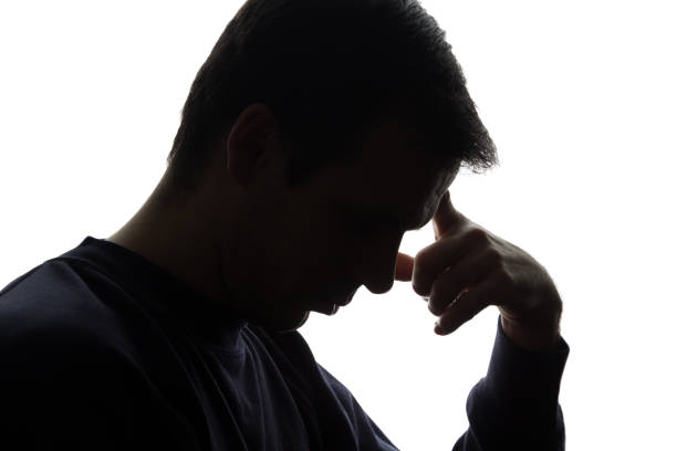istock The young man thought - silhouette 672185066