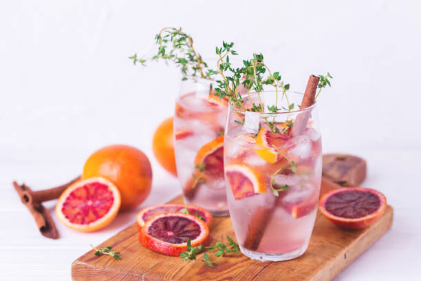 istock Orange lemonade with thyme, cinnamon, ice and honey 672185282