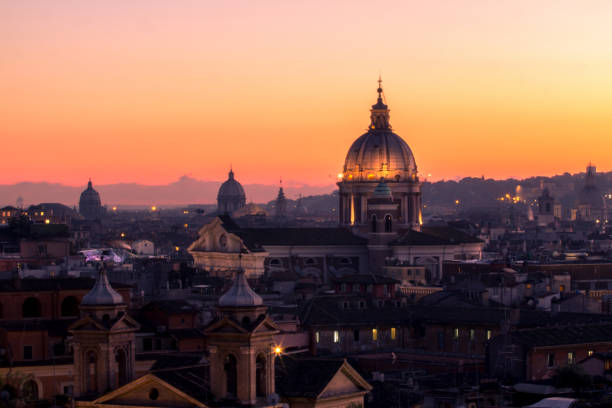 istock Panorama view of Rome at sunset with St Peter Cathedral 672201386