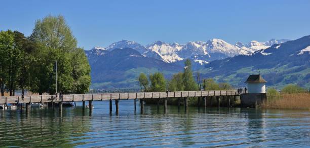 istock Lake Zurichsee and snow capped mountains 672204674