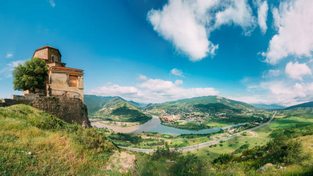 mtskheta georgia. ancient georgian church of holly cross, jvari monastery with remains of stone wall - mtskheta imagens e fotografias de stock