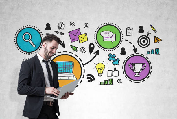 istock Man with laptop and bright prize, concrete 672210184