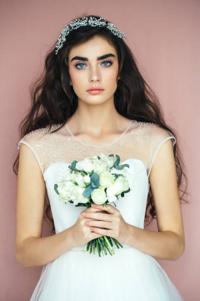 istock Studio shot of young beautiful bride 672210756
