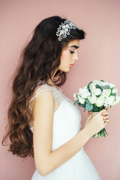 istock Studio shot of young beautiful bride 672213410