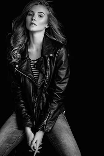 Beautiful girl wearing leather jacket