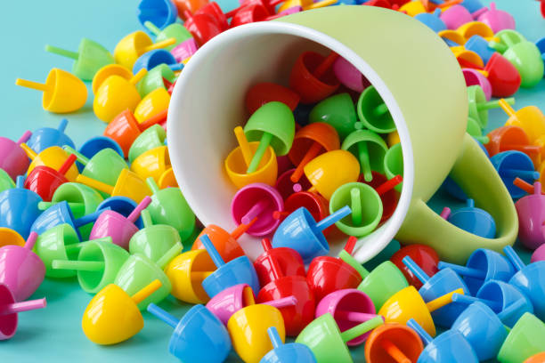 istock colorful toys on aquamarine table. 672216604
