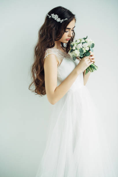 istock Studio shot of young beautiful bride 672216842
