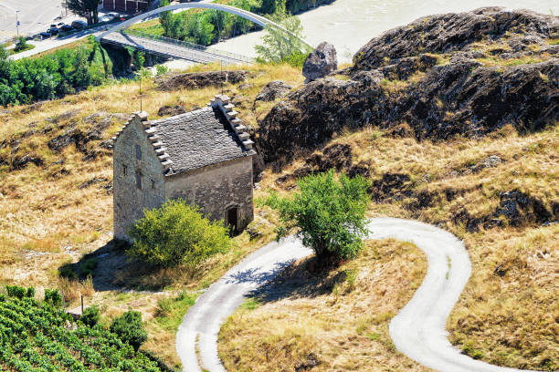 Old house at Rhone River in Sion
