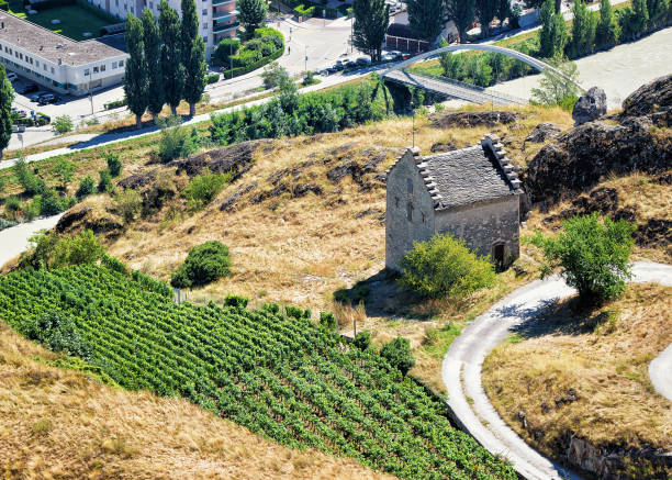 Old house at Rhone River of Sion