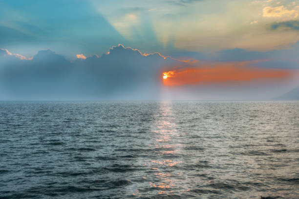 Sunset over lake Atitlan in as viewed from the shores of the lake in Panajachel, Guatemala.