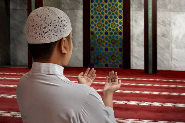 istock Muslim man praying in mosque 672235944