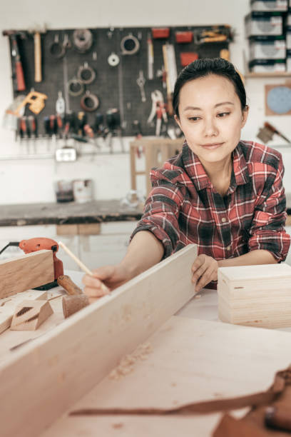 istock Furniture designer at woodworking studio 672236398