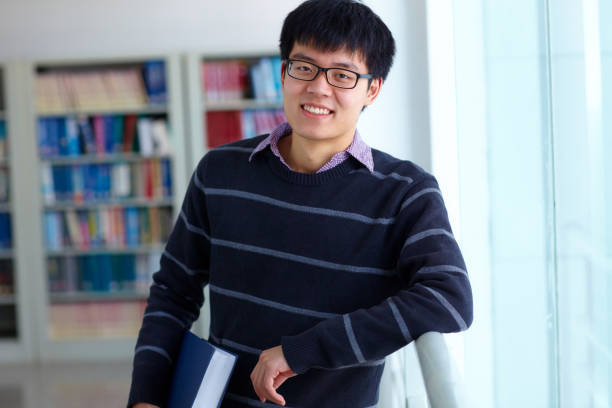 istock One young asian college student study in the library 672236568