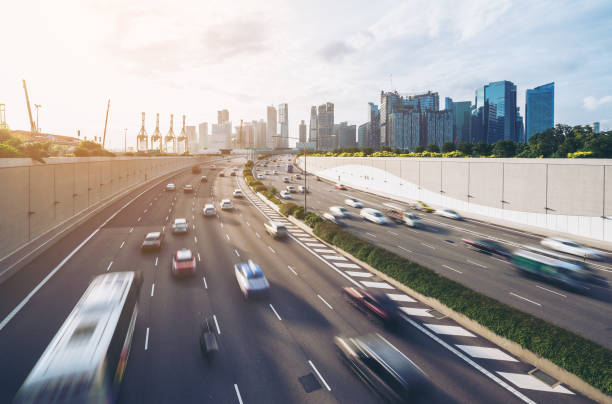 istock Busy road and city background during rush hour 672237088