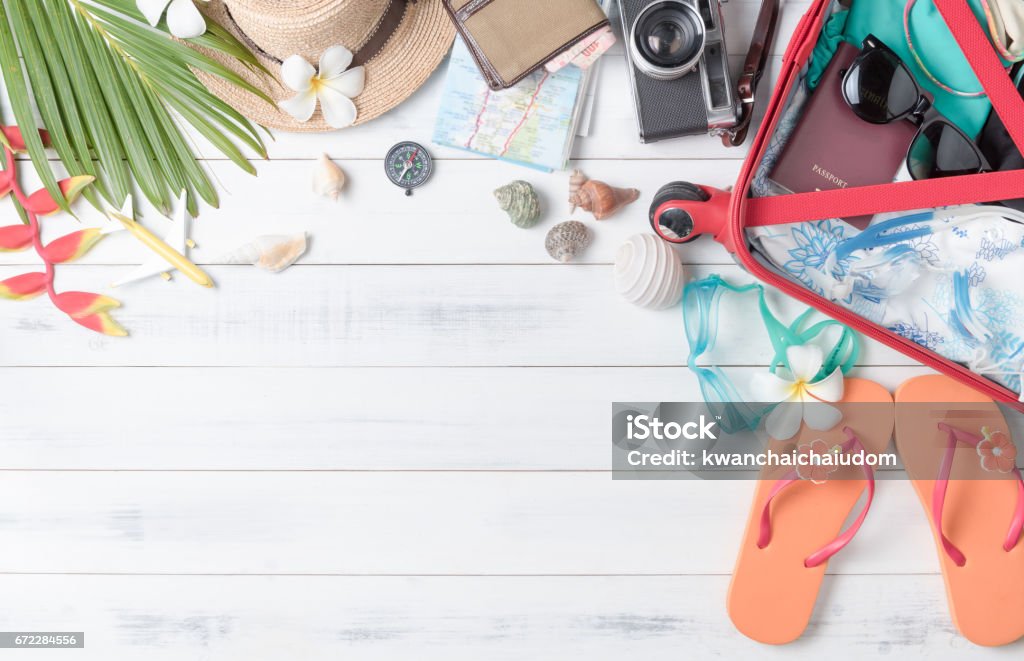prepare accessories and travel items for summer prepare accessories and travel items for summer on white wooden board, flat lay, top view background Flat Lay Stock Photo