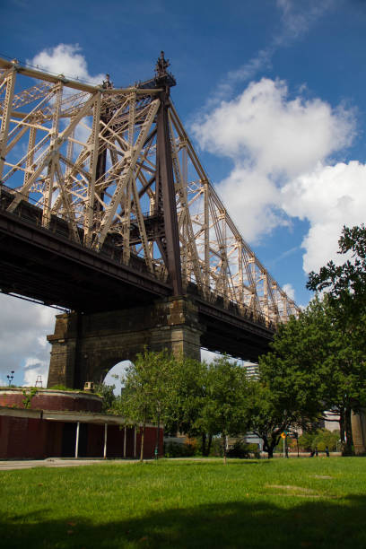 istock Queensboro bridge at the park with blue sky 672289108
