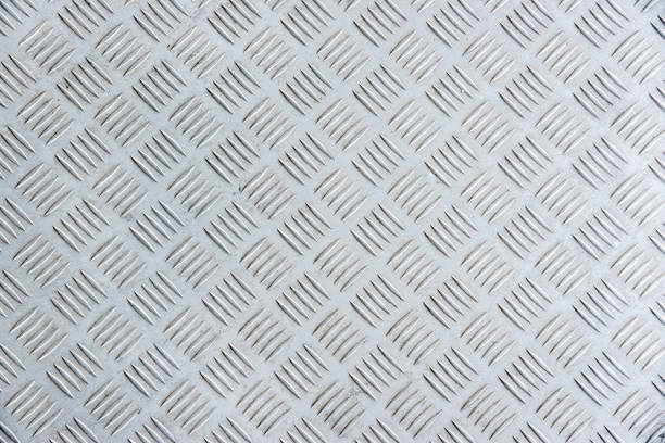 istock old metal diamond plate as background. 672294854