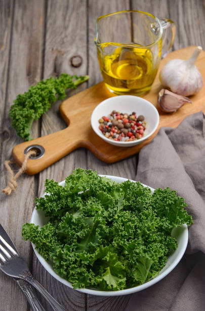 istock Fresh kale with olive oil, garlic and pepper 672301374