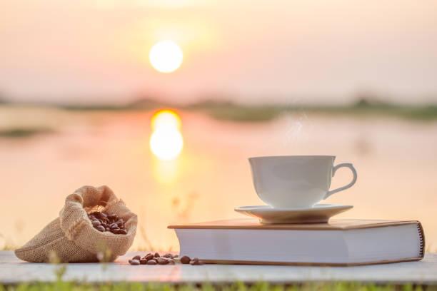 istock coffee cup and coffee bean in the morning 672301518