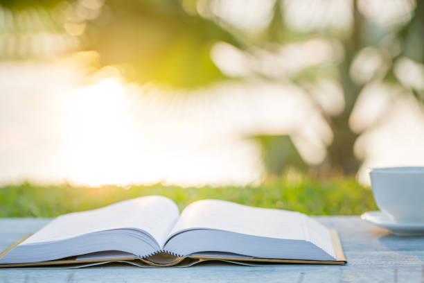 istock coffee cup and book in the morning 672304478