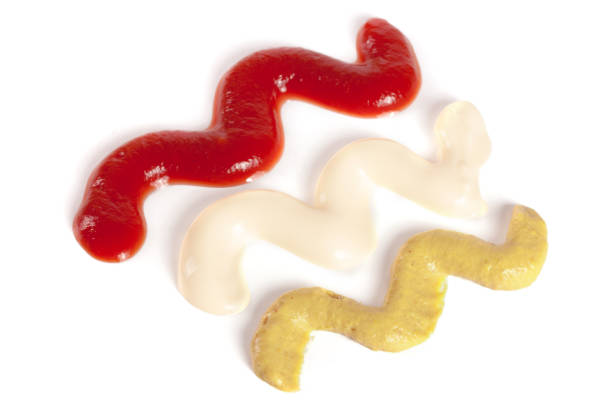 istock Ketchup mayonnaise and mustard isolated on white background 672305902