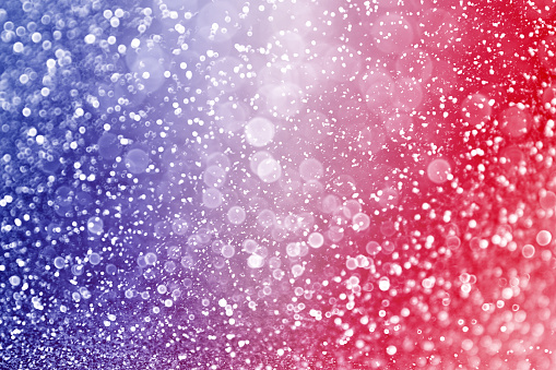 Abstract patriotic red white and blue glitter sparkle background