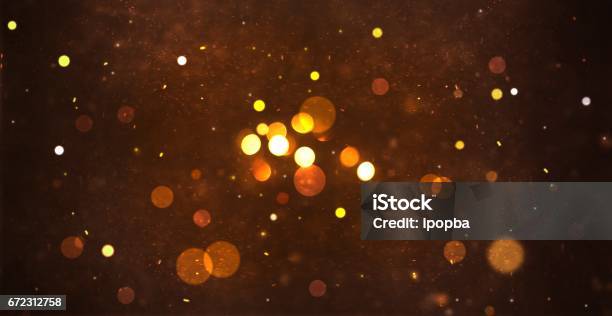 Gold Abstract Particle And Bokeh For Background Stock Photo - Download Image Now - Defocused, Particle, Blurred Motion