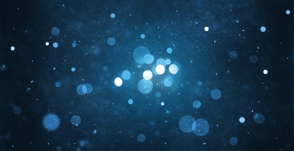 bokeh de partícula abstracta con fondo azul oscuro photo