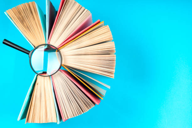 top view of bright colorful hardback books in a circle. - brown paper imagens e fotografias de stock