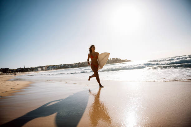 istock Enjoy day at the beach with surfboard 672313618
