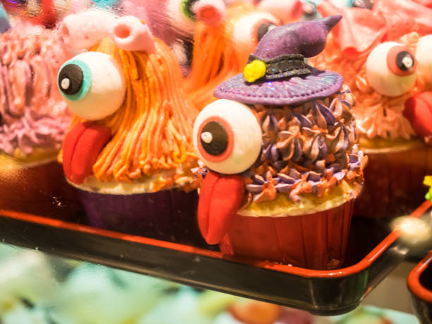 istock Fancy monster cupcakes on Halloween festival 672314428
