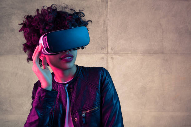istock Young stylish girl in VR headset 672316928
