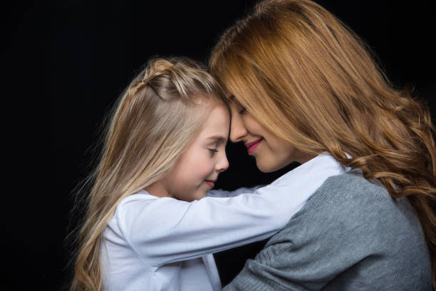istock Young mother with little daughter 672320418