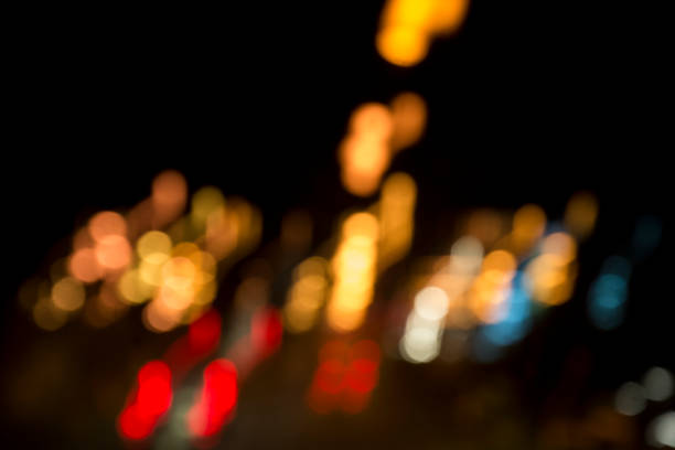istock Abstract defocused of bokeh blur acceleration speed motion on night road 672320988