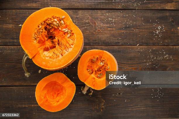 Set Of Orange Pumpkins On Wood Flat Lay Free Space Stock Photo - Download Image Now - Pumpkin, Open, Cross Section