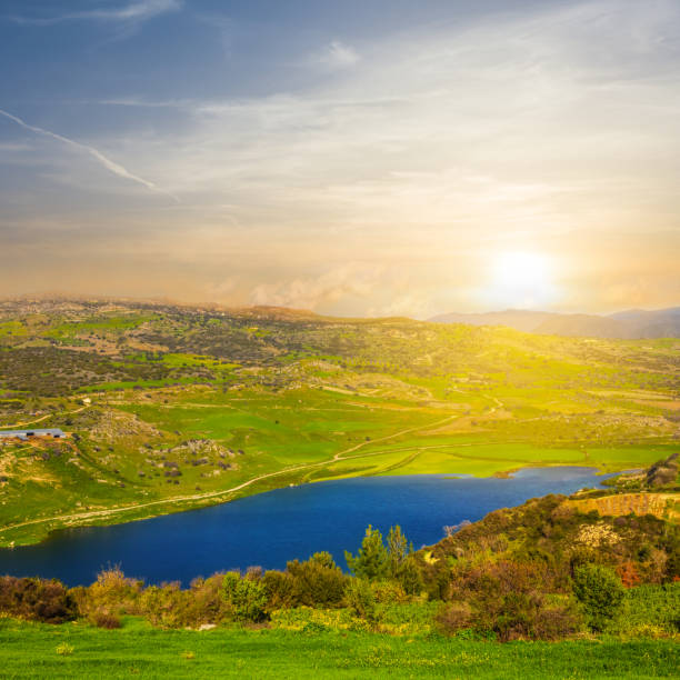 istock green rural valley at the sunset 672323964