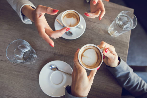 istock Close up of two women on coffee break. 672323984