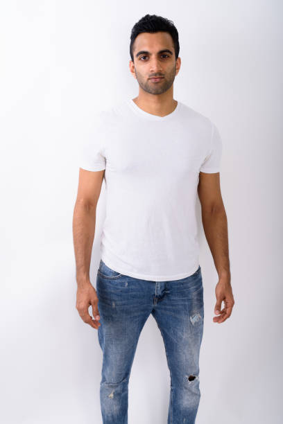 istock Studio shot of young handsome Indian man against white background 672331060