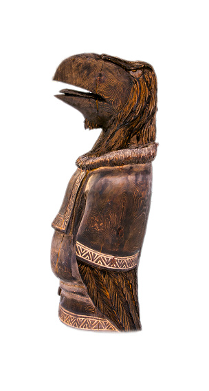 wooden Aboriginal idol on Kamchatka on white background
