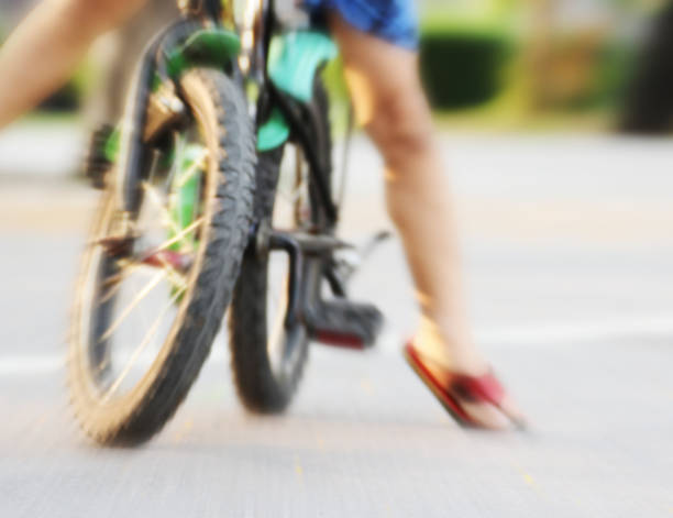 istock Motion blur of biker in a park 672358694