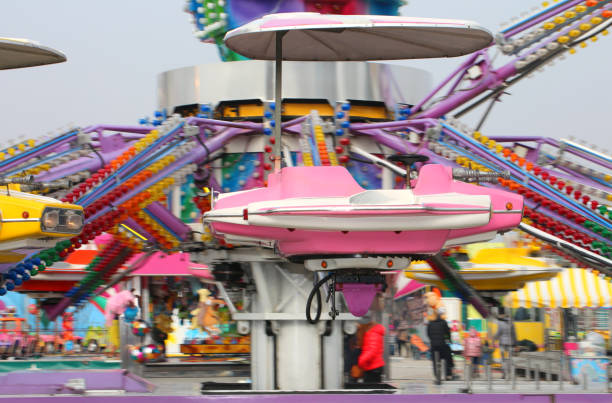 istock nacelle of a carousel as it spins wildly 672361816