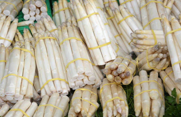 istock white asparagus for sale in the grocery store 672362096
