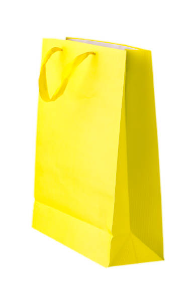 istock Yellow shopping bags on white 672365266