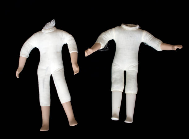 istock Broken Doll Body Figure on Black Background 672369092