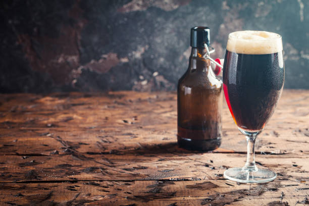 istock Glass of dark beer 672369784