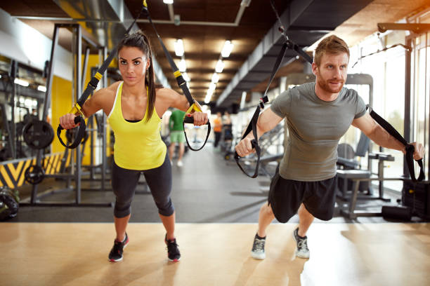 istock Couple on body training in gym 672372952