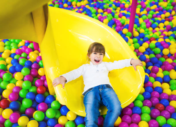 istock Little girl playing on playground 672380984