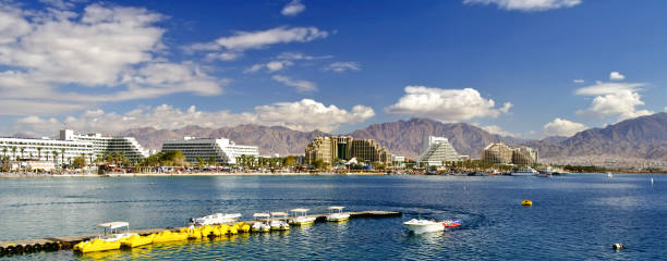 istock Sunny day at central public beach and marina in Eilat, Israel 672386710