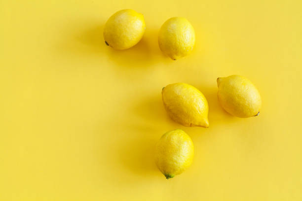 Lemon on yellow background