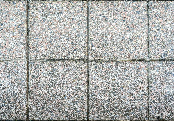 istock Old outdoor pavement slabs or concrete stone plates. 672394278